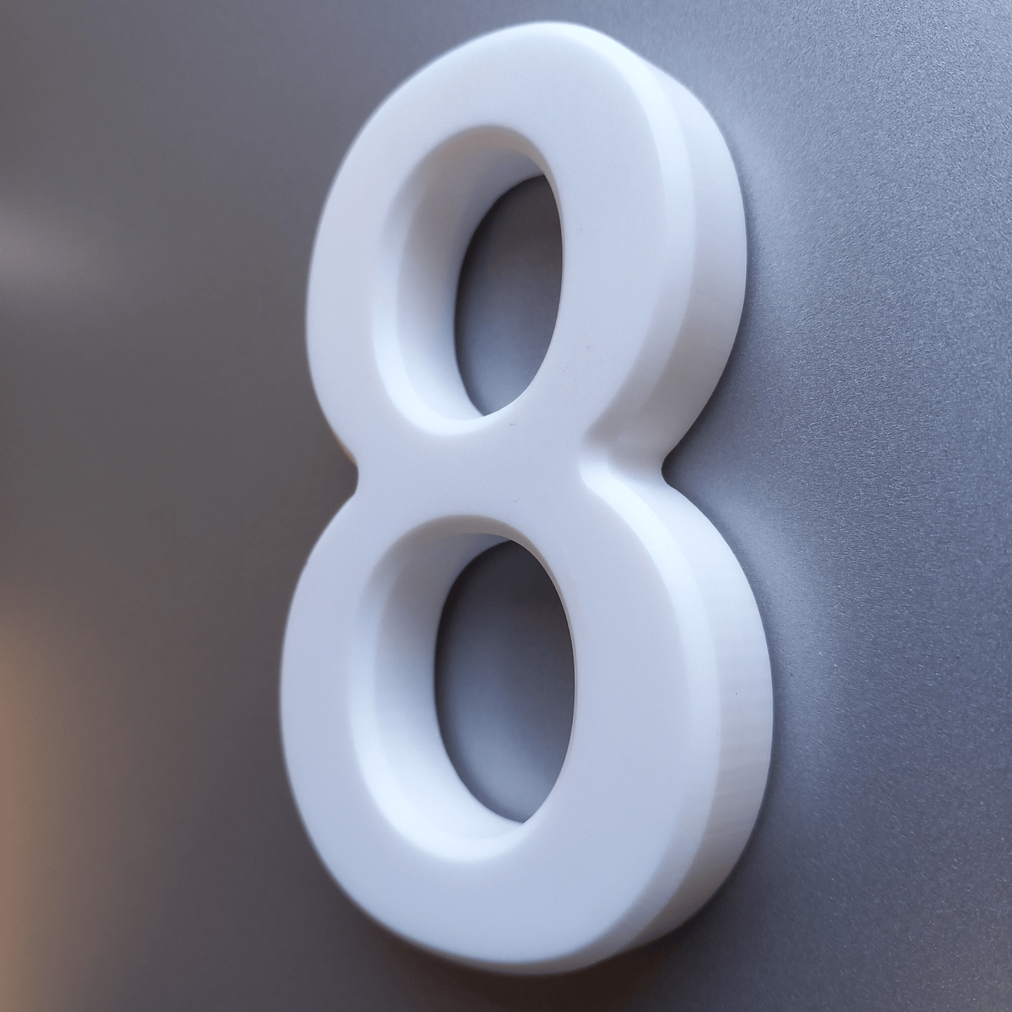 Corian Stick On Numbers - White and Grey (100mm high) - housenumbers.ie