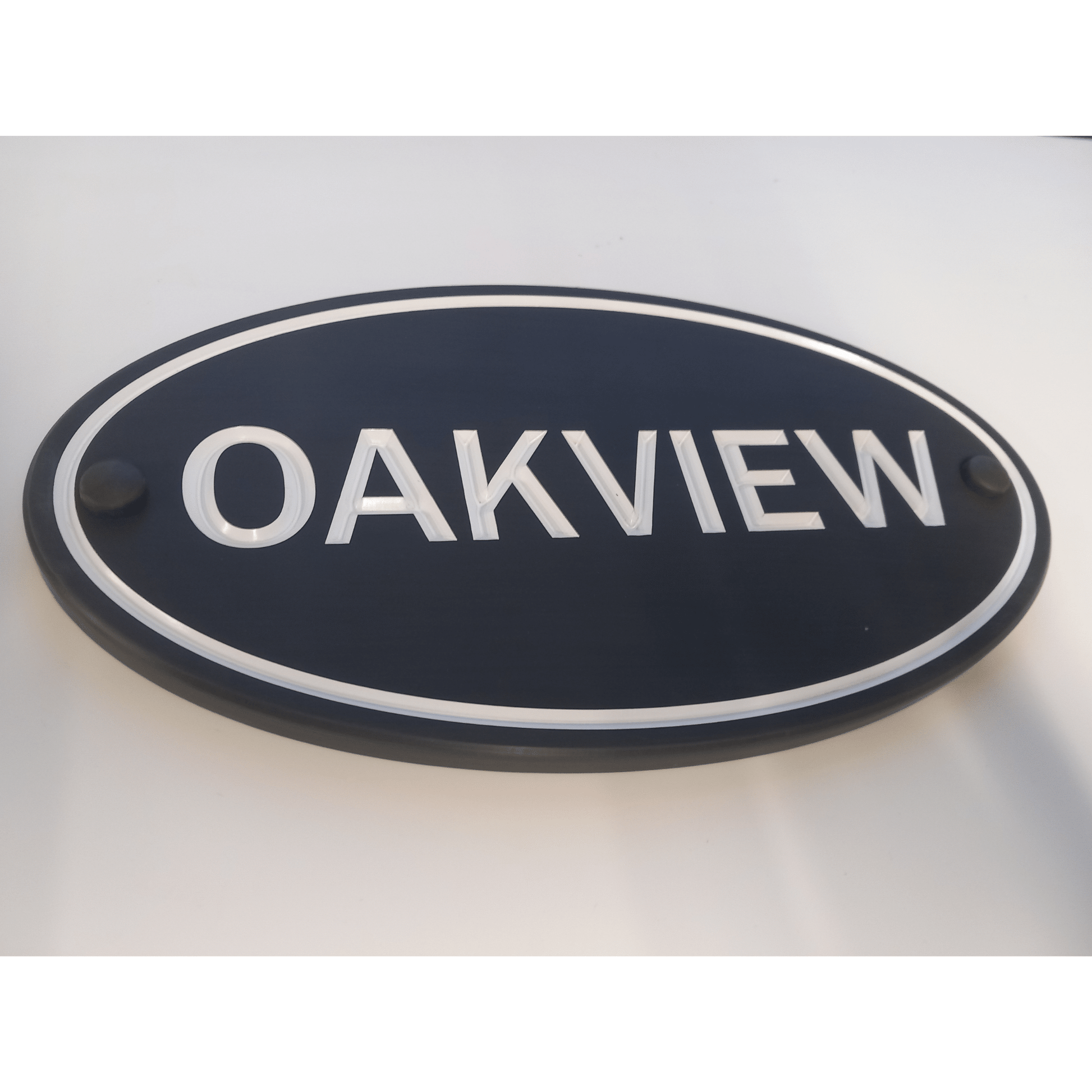 Grey Oval Corian Sign (315x170mm) - housenumbers.ie