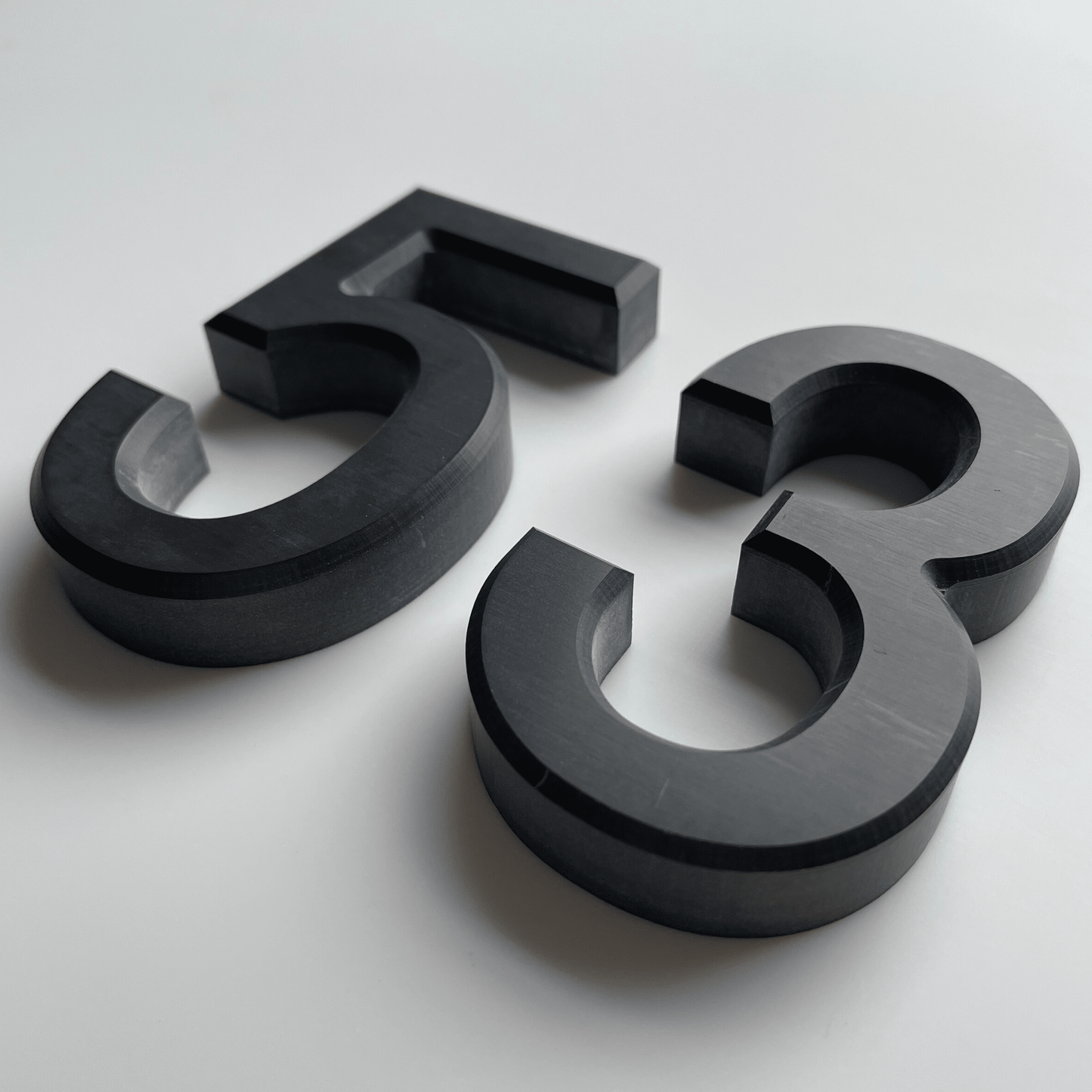 Corian Stick On Numbers - White and Grey (100mm high) - housenumbers.ie