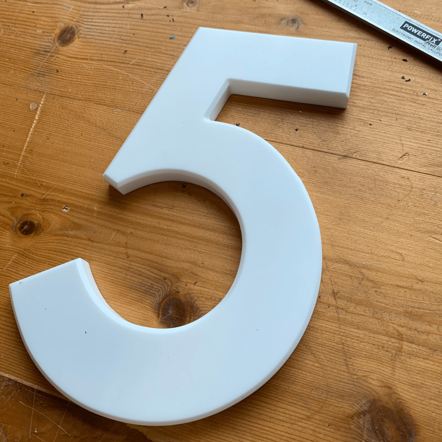 Corian Stick On Numbers - White and Grey (150mm high) - housenumbers.ie