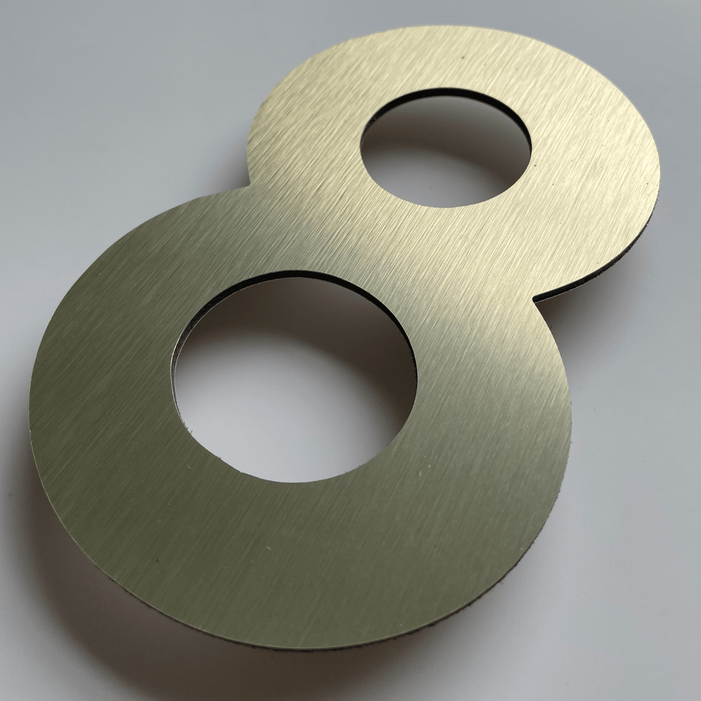 Floating Number 8 - Brushed Gold (150mm high) - housenumbers.ie