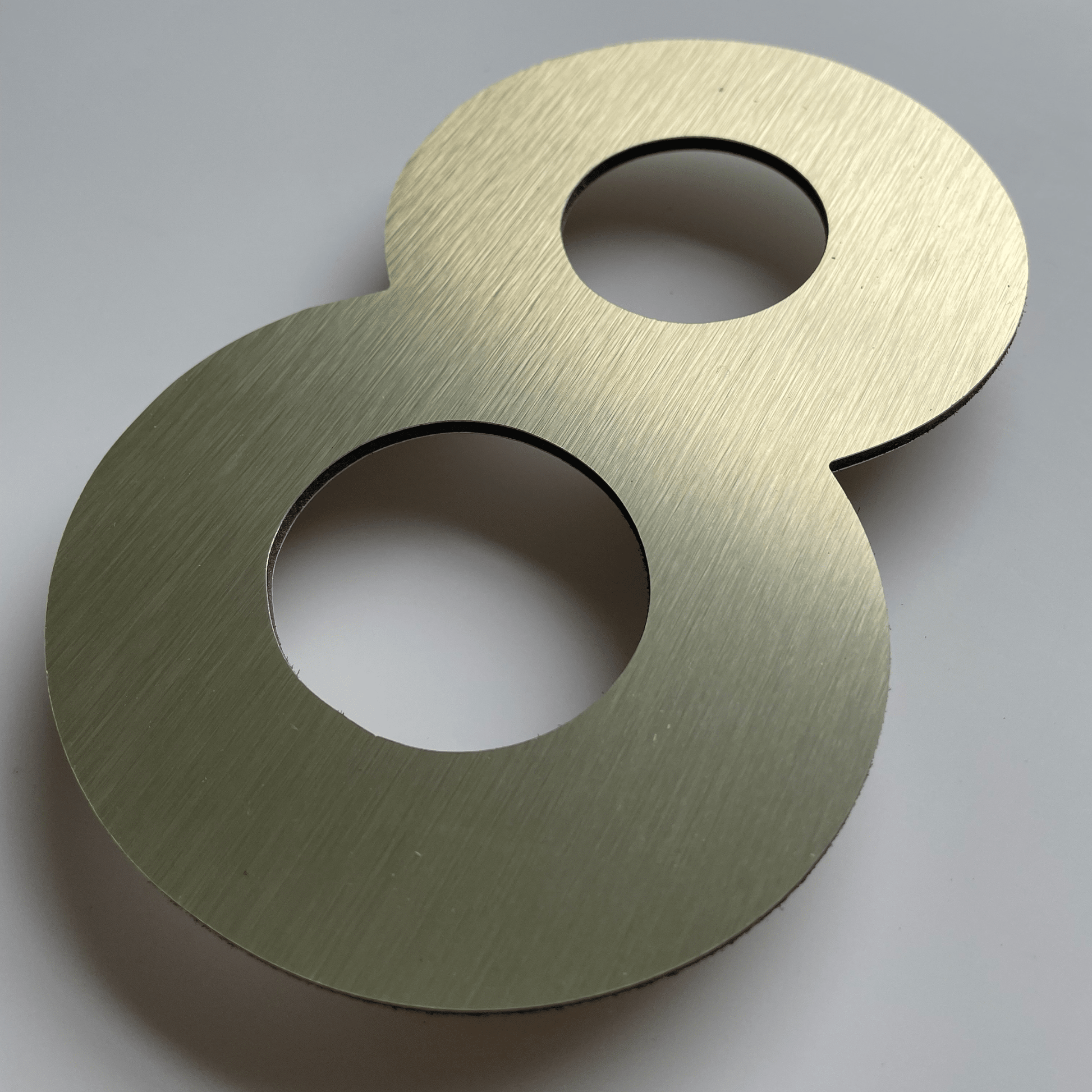 Floating Number 8 - Brushed Gold (150mm high) - housenumbers.ie