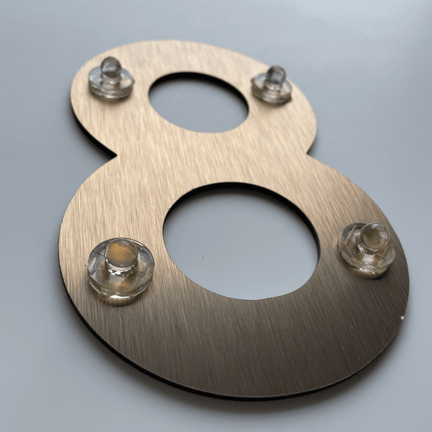 Floating Number 8 - Brushed Gold (150mm high) - housenumbers.ie
