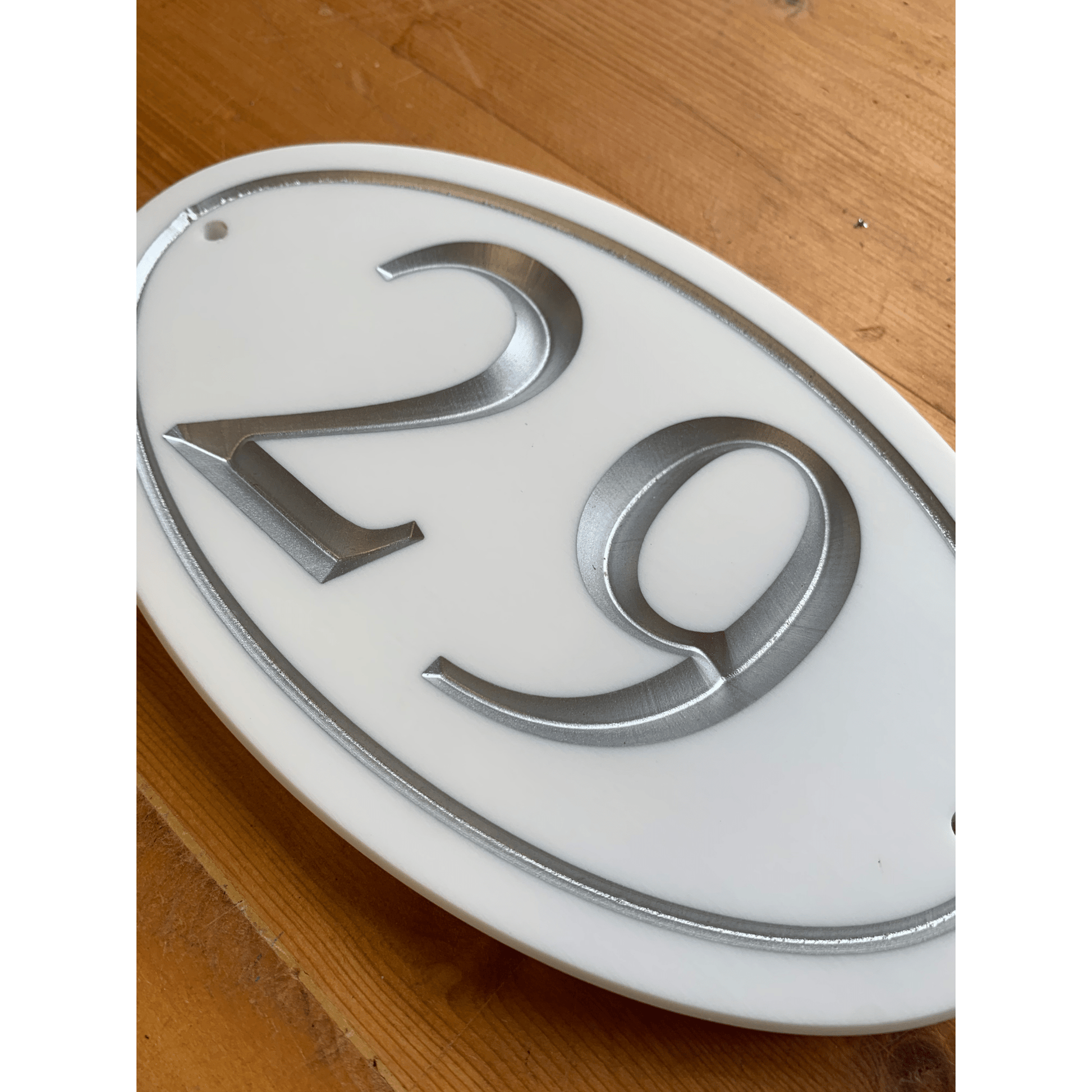 White Oval Corian Sign (195x115mm) - housenumbers.ie