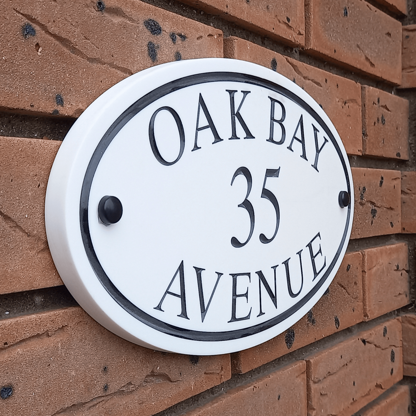 White Oval Corian Sign (315x170mm) - housenumbers.ie