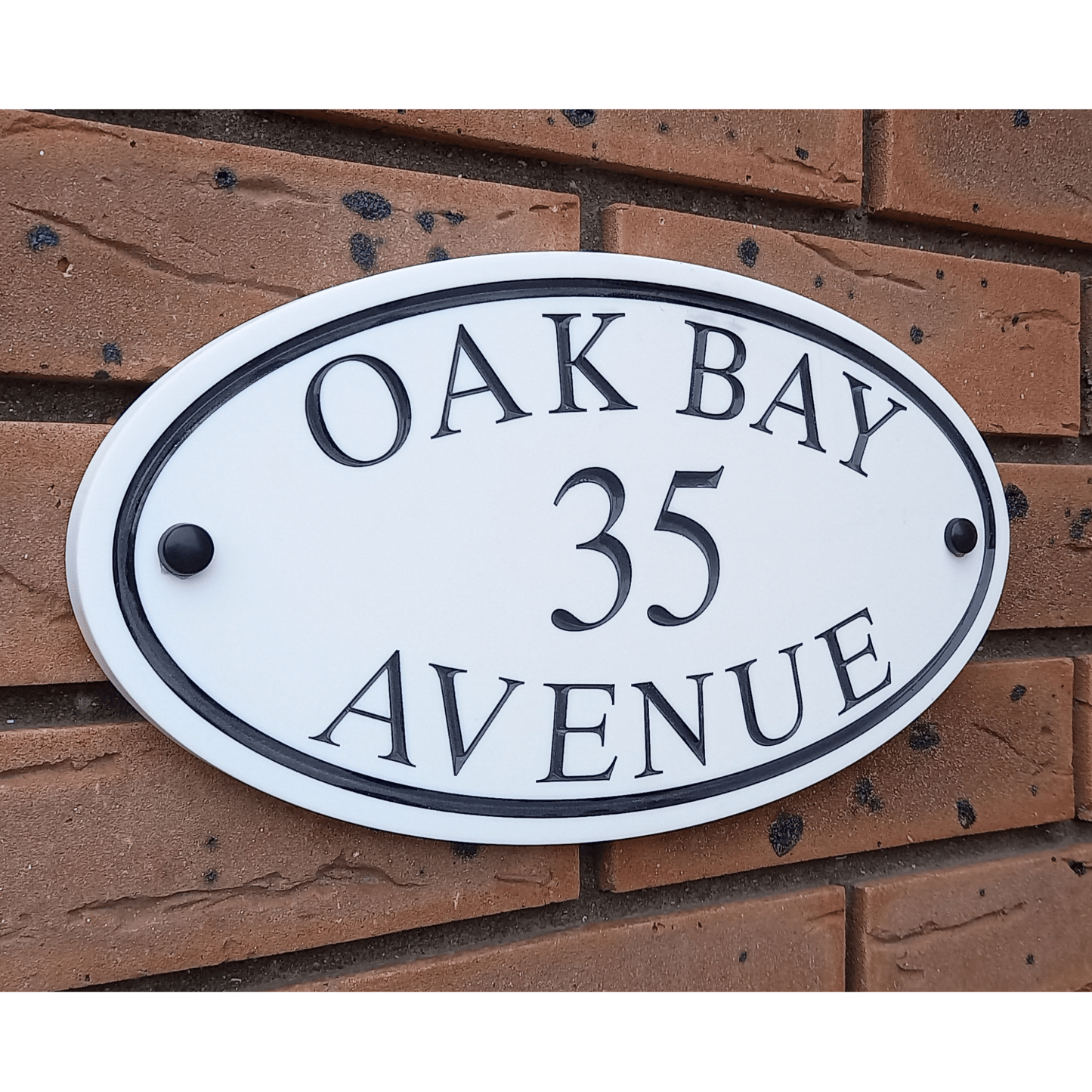 White Oval Corian Sign (315x170mm) - housenumbers.ie