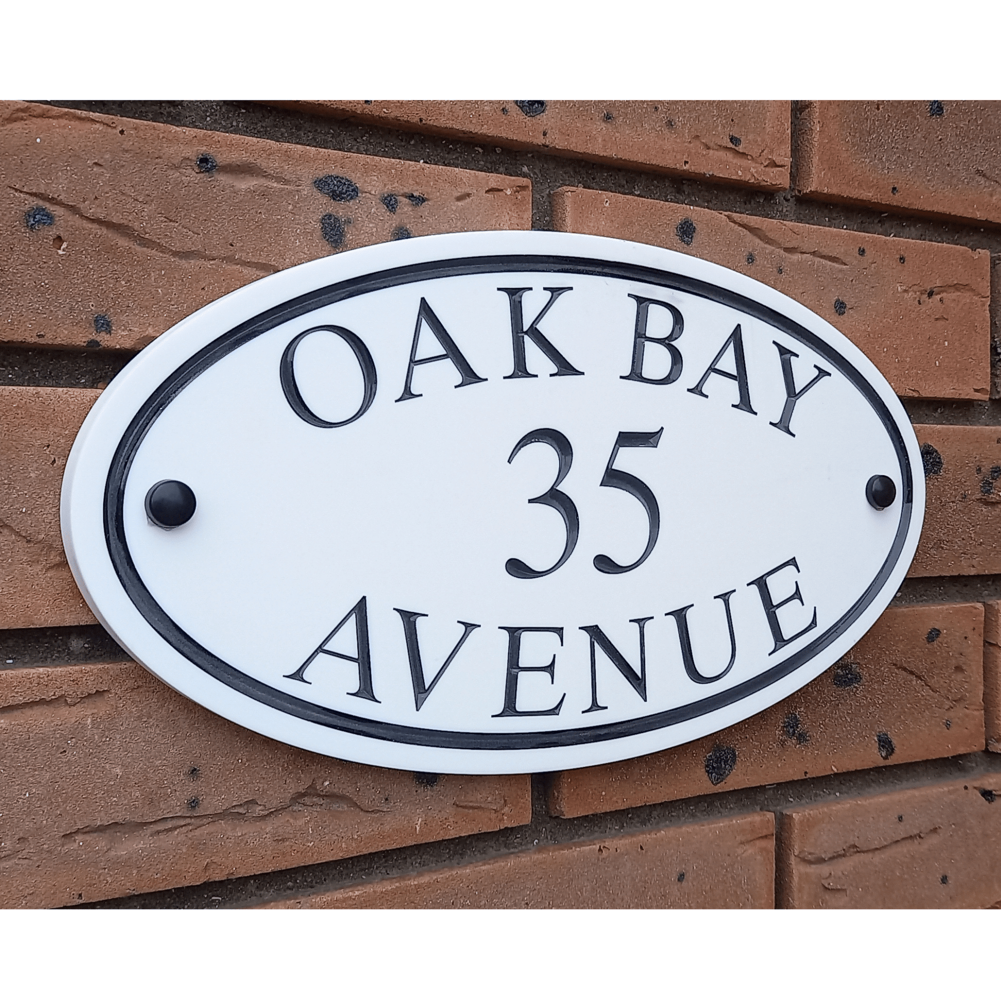 White Oval Corian Sign (315x170mm) - housenumbers.ie